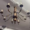 Antique 8-light chandelier, 1940s, turned wood and wrought iron. 90 cm diameter.