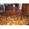 Flame mahogany center desk, mid-19th century Empire style, cm L129xP67xH80