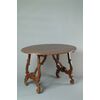 Marche, late 17th century, lyre-shaped center table in carved wood     