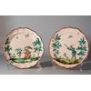Felice Clerici manufacture (Milan, Second half of the 18th century), Pair of plates with hunter and Chinese man, polychrome majolica     