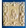Formella in maiolica ingobbiata con busto di Madonna e Angeli al centro  e motivi floreali e rocaille sul bordo.Emilia.