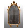 Antique Louis XV Neapolitan mirror in gilded and carved wood. Period XVIII century.     