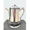Chocolate pot in silver plate with embossed geometric motifs. United States. Wilcox signature silver plate Co. Meriden.Conn and date 1878.     