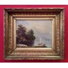 Dipinto ad olio di un paesaggio con cornice dorata