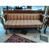 Pair of lacquered and gilded sofas