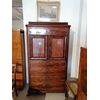 Mahogany cabinet with drawers and doors     