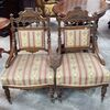 Pair of mahogany armchairs with English Victorian sculpture works