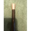 Bastone con pomolo in argento con iniziali,canna con anima flessibile rivestita da dischi in legno.