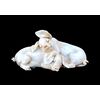 Porcelain sculpture of a pair of crouching pigs. Tay Manufacture (Giuseppe Tagliarol).     