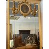 Mirror in lacquered and gilded wood. H190 x123     