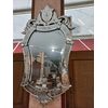 Venetian mirror with floral decoration.     