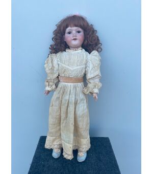 Doll with bisque head and papier-mâché body Original dress Armand Marseille initials, letters and numerical elements Germany     