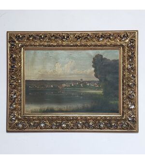 Dipinto olio su tela raffigurante un paesaggio con cornice intagliata e traforata 