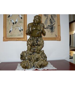 FŪJIN, Dio del vento. Giappone. Periodo Meiji (1868 -1912 ) fine XIX secolo.  ceramica invetriata cm 50 h.