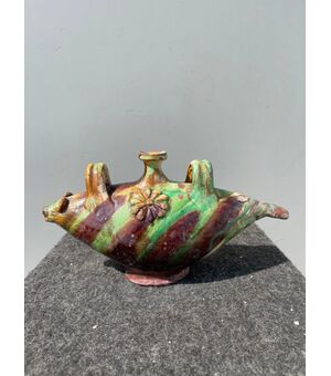 Water bottle in the shape of a stylized fish in glazed and engobed terracotta. Seminara Calabra.     