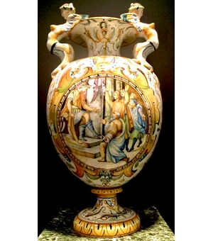 Large majolica vase with side sockets in the shape of harpies and Raphaelesque and grotesque decoration. Central medallion with historiated scene with characters. Cantagalli, Florence.     