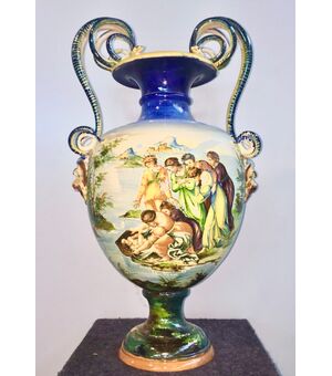 Large majolica vase with snake and mascaron handles and historiated decoration.Painter Eliseo Bertazzoni.Molaroni Manufacture, Pesaro.     