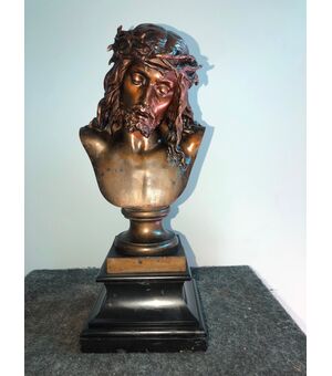 Bronze bust of Christ on a blackboard stone base.Italy     