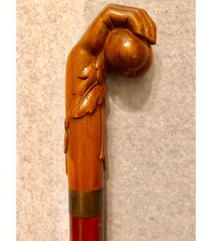 Stick (erotic) with knob in boxwood representing a hand with fruit.     