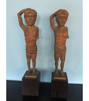 pair of wooden sculptures, h 45 cm base     