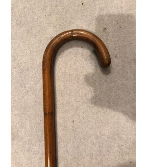 Animated defense stick with braided metal truncheon and bamboo cane.     
