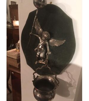 silver holy water stoup with putto     