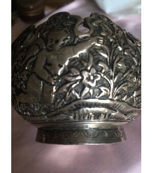 Embossed silver container with cherubs     