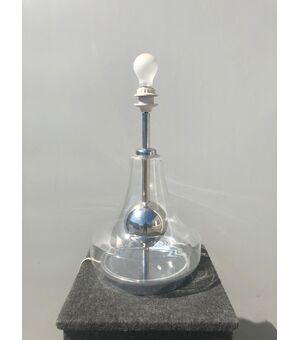 Glass and metal lamp.     