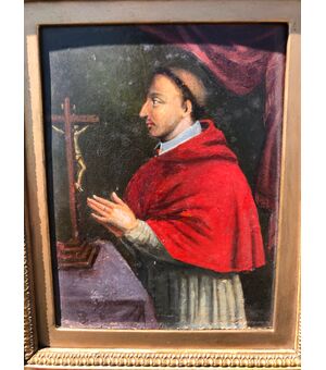 Small oil painting on panel depicting San Carlo Borromeo.     