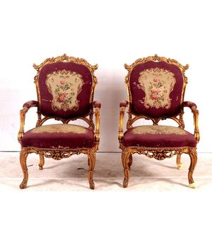 Coppia di antiche poltrone del 1800 stile Luigi XV dorate con intagli