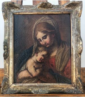 Oil painting on canvas depicting Madonna with Child Jesus. Emilian school.     