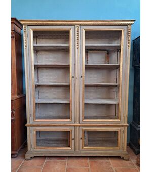 Libreria a 4 porte laccata e dorata con rete