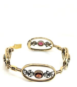 BRACCIALE SEMIRIGIDO IN ORO ARGENTO RUBINI E DIAMANTI
