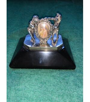 Silver press-papier paperweight with two cherubs and picture frame with miniature in ivory. Blackboard stone base.     