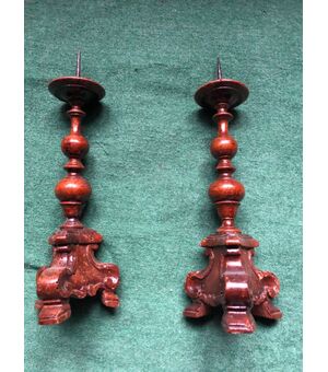 Pair of candlesticks in natural carved wood.Genoa.     