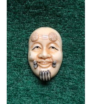 Netsuke &#39;in ivory with male face. Japan.     