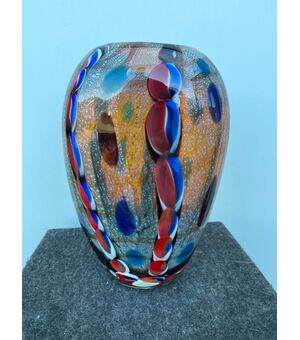 Vase in heavy sommerso glass with inclusion of murrine and silver leaf.Giulio Radi for AveM Murano.     