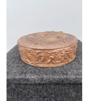 Terracotta box with mythological scene and trophies.Signa, Tuscany.     