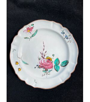Majolica plate with rose decoration Finck manufacture, Bologna.     