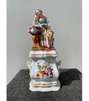 Veilleuse in figured porcelain with floral decoration. France.     