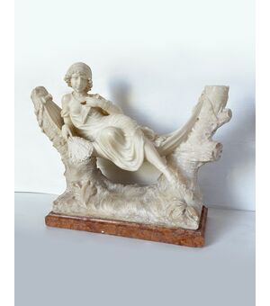 Scultura donna su amaca - inizio Novecento