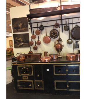 Nime chimney kitchen with copper accessories     
