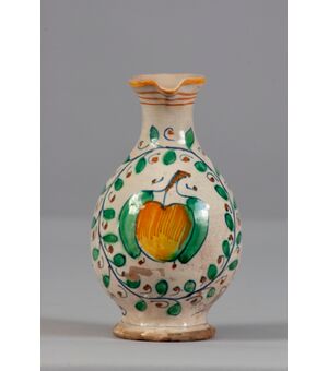 Pesaro, Late 16th century, Pitcher with apple within a vegetable shoot in polychrome majolica     