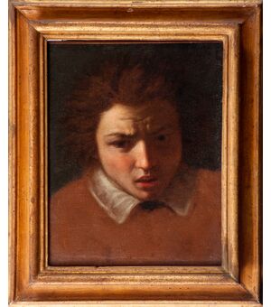 Caravaggesco Painter, 17th Century, Portrait of a Child, oil on canvas with gilt wood frame     