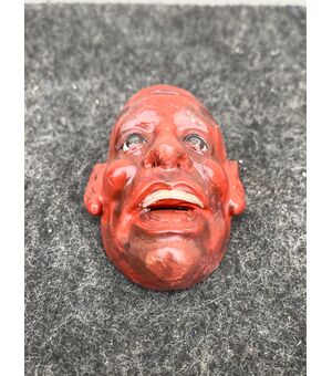 Lacquered papier-mâché mask with glass eyes. Japan.     