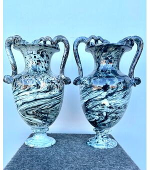 Pair of majolica vases with two serpentine handles and marbled decoration.     