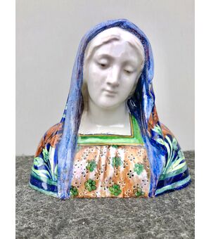Majolica bust of Madonna with floral decoration in art nouveau style, made by Angelo Minghetti, Bologna.     