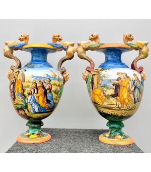 Pair of majolica vases with grotesque handles and Urbino-style historiated decoration Brand SCA Pesaro (Molaroni)     