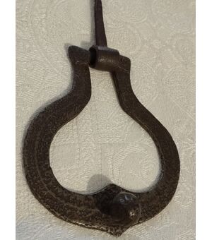 Small door knocker in forged and chiseled iron     