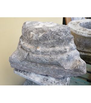 Pair of lesena capitals, in pink marble     